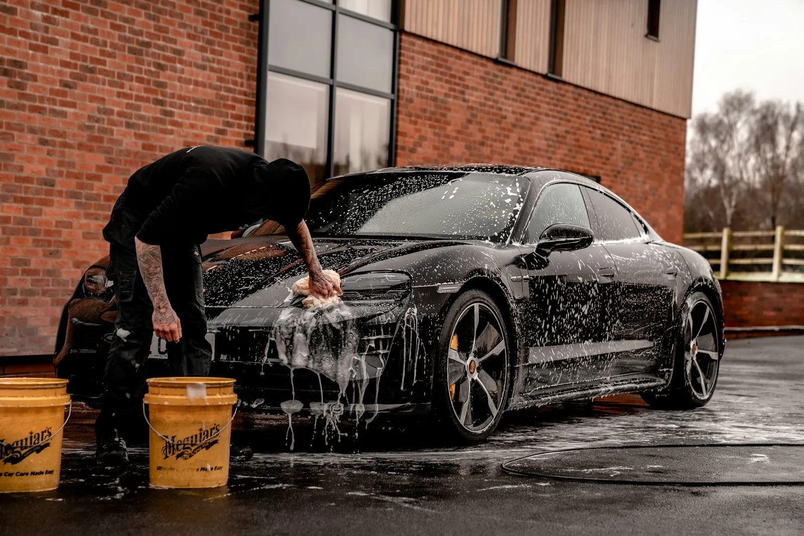 A vehicle being professionally detailed at The Motoring District